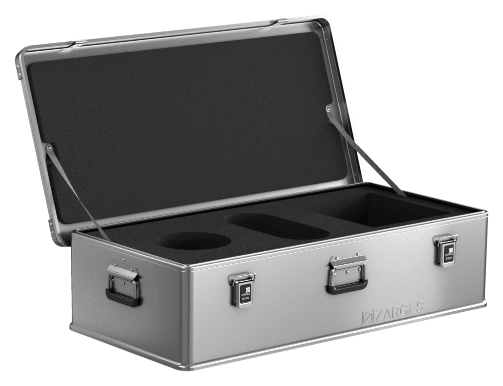ZARGES K470-31011136 case open, black foam insert with round cutouts and foam-lined lid