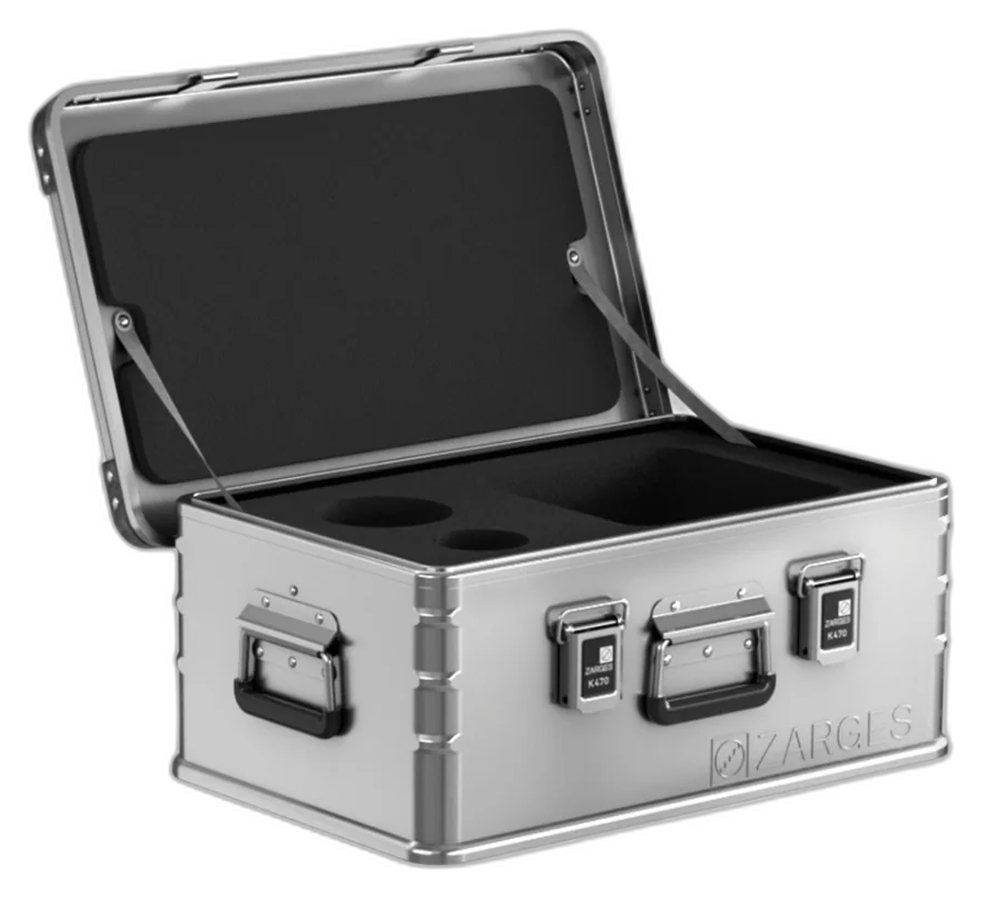 ZARGES K470-40568 open with a black foam insert cut with round and rectangular pockets