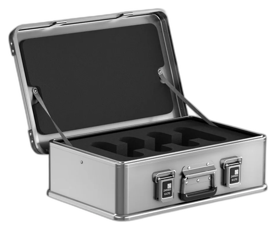 ZARGES K470-40810 aluminum case open on its lid stays with a custom-cut black foam insert