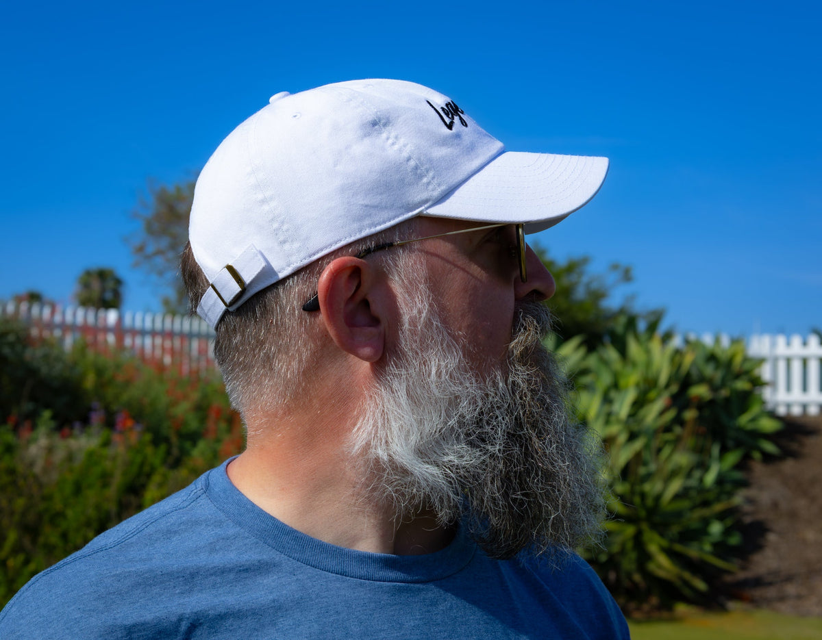 Rear three-quarter view of the white ZARGES Legendary 47' Hat with adjustable back strap