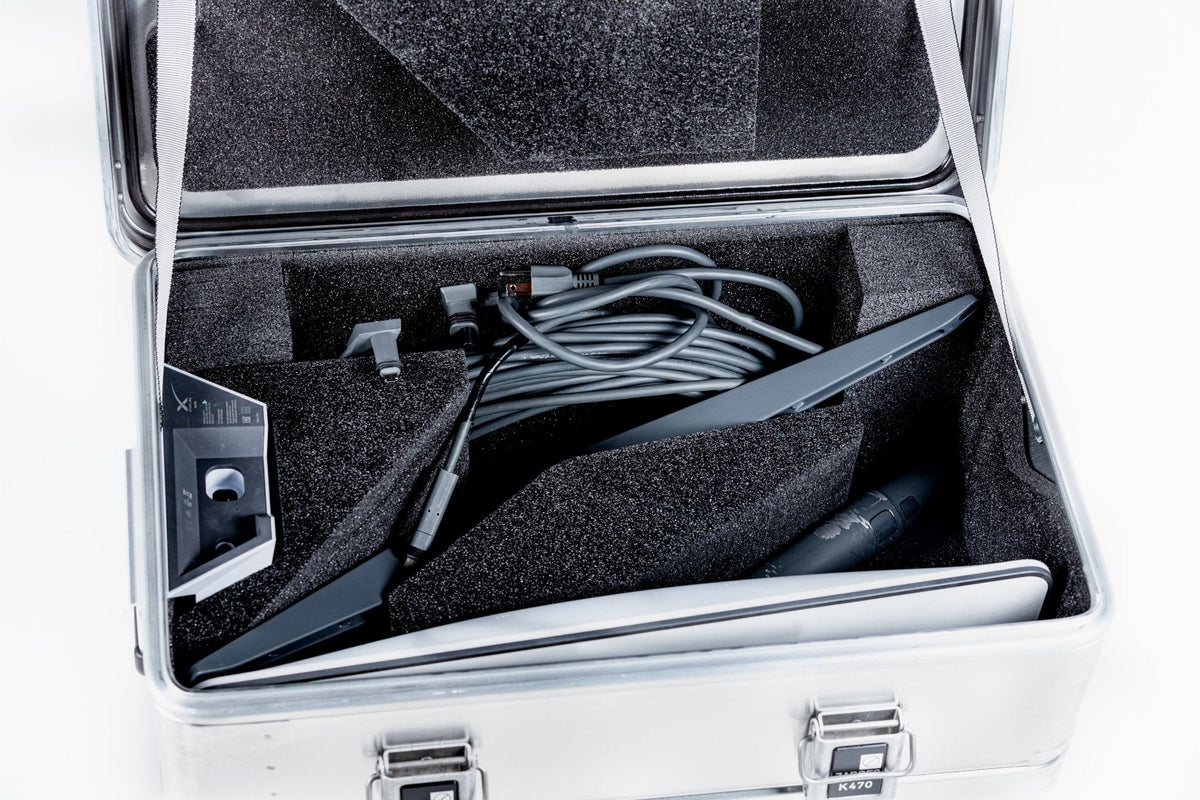 Close-up inside the ZARGES Starlink Small Shuttle Case, black foam holding the dish, router and cable