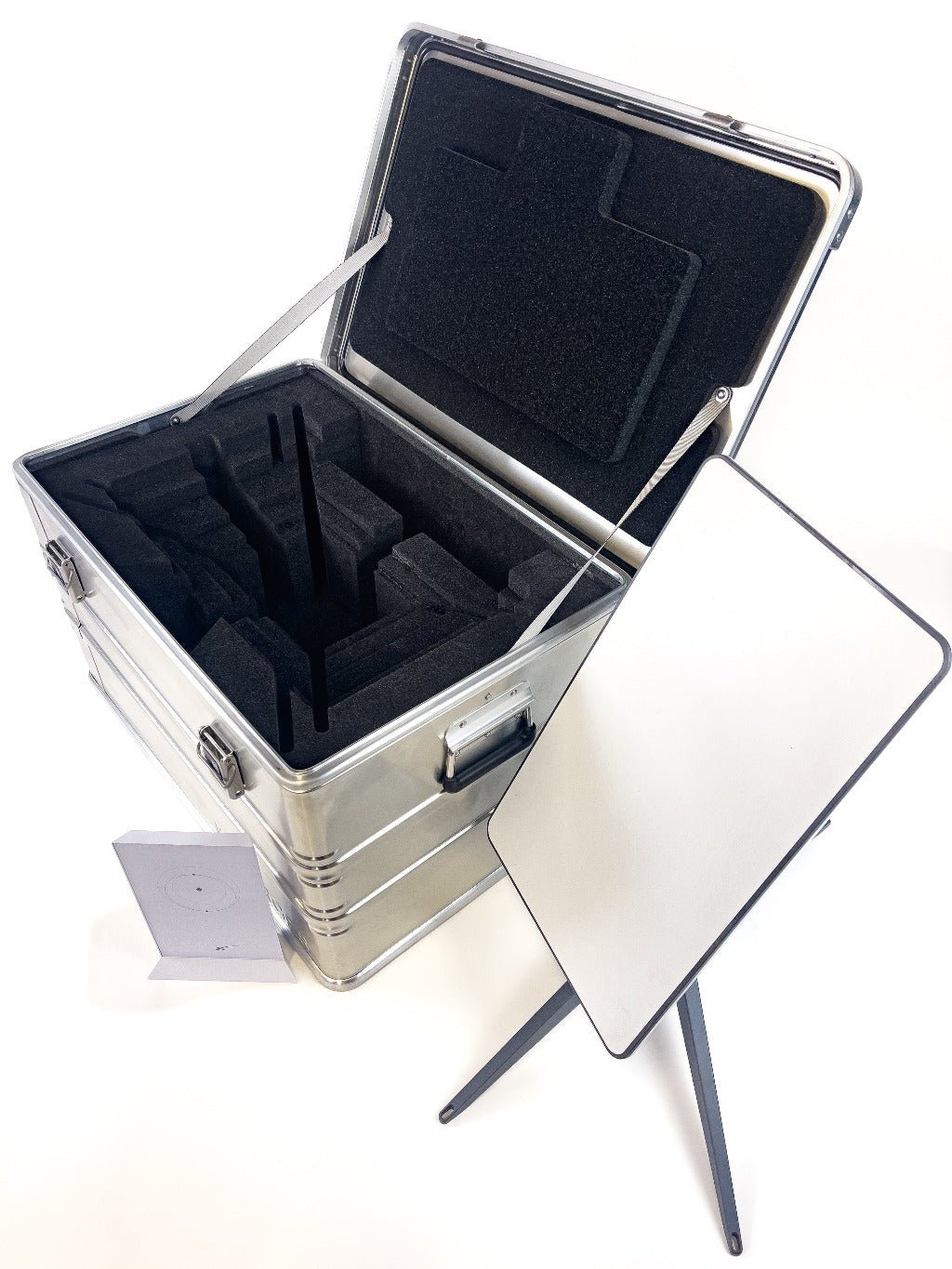 ZARGES Starlink Shuttle Case open to its cut-foam compartments, Starlink dish on its stand alongside