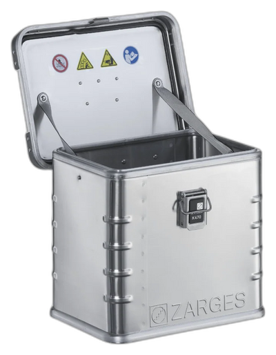 ZARGES K470-40677 case with lid open, empty interior and safety labels inside the lid