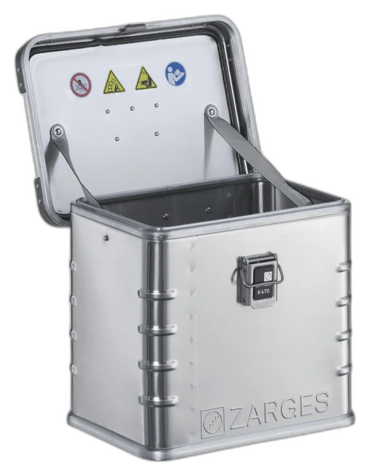 ZARGES K470-40677 case with lid open, empty interior and safety labels inside the lid