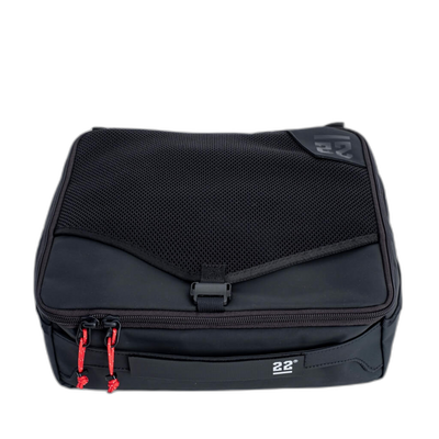 Step 22 Quoll Cube HD Large packing cube in black, closed, mesh lid panel with buckle and red zipper pulls