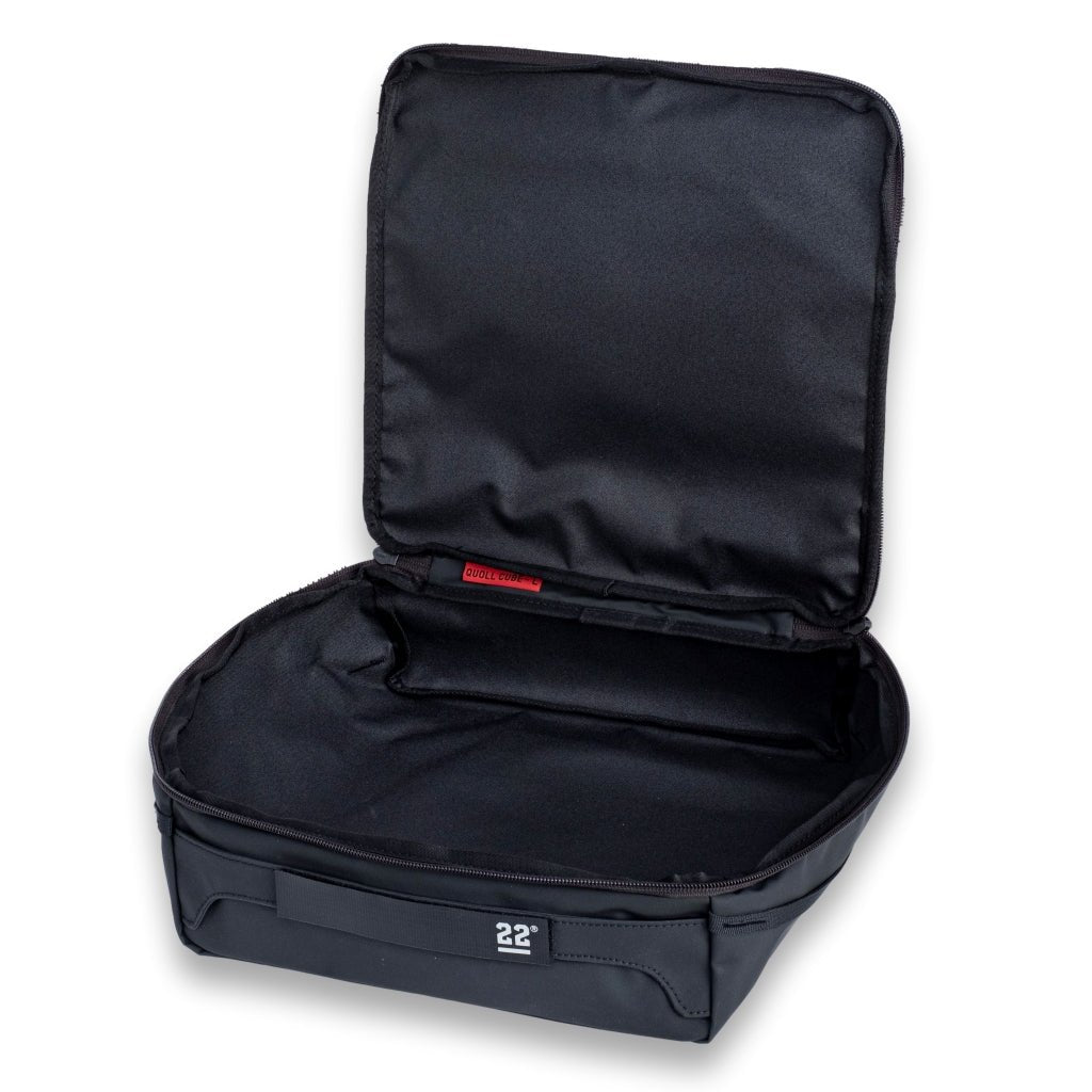Step 22 Quoll Cube HD Large packing cube unzipped and open, showing the empty black interior
