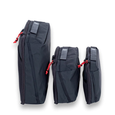 Three Step 22 Quoll Cube HD Packing Cubes standing on end in large, medium and small sizes