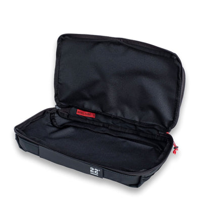 Step 22 Quoll Cube HD Packing Cube, Small, unzipped and open to show the black lined interior