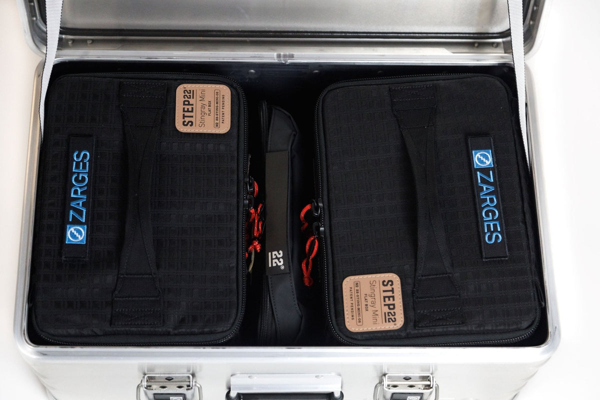 Two Step 22 Stingray Flat Box Minis seen from above, filling an open ZARGES aluminum case
