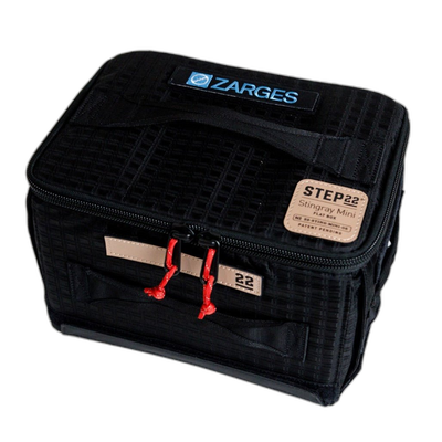Step 22 Stingray Flat Box Mini, black grid fabric with ZARGES patch, tan label and red zipper pulls