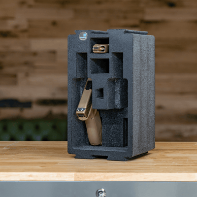 ZARGES Chameleon Module - Double Pistol on a workbench, holding a tan pistol and a spare magazine