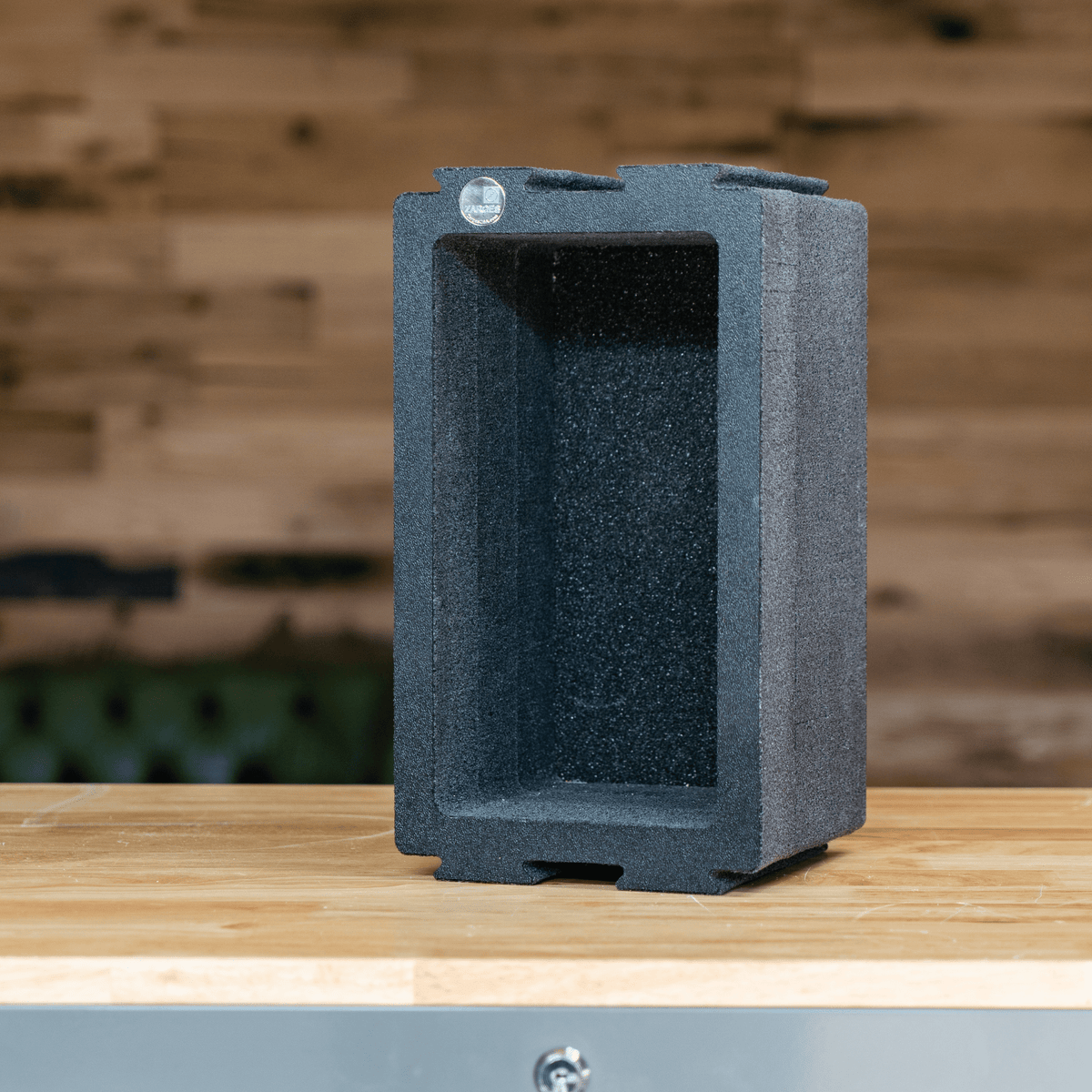 ZARGES Chameleon Module - Double-Wide Open standing on end on a wooden workbench