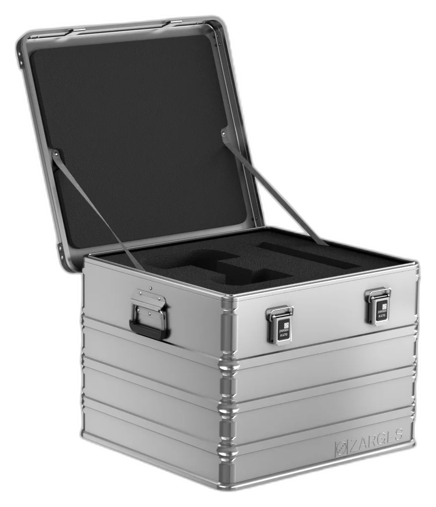 ZARGES K470-40839 aluminum case open with a custom-cut black foam insert in the base