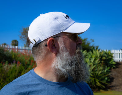 Rear three-quarter view of the white ZARGES Legendary 47' Hat with adjustable back strap
