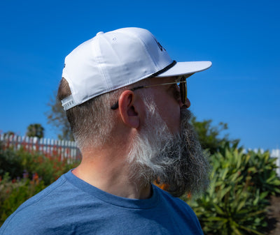 Back view of the ZARGES Legendary White Rope Hat worn outdoors, showing the rear strap