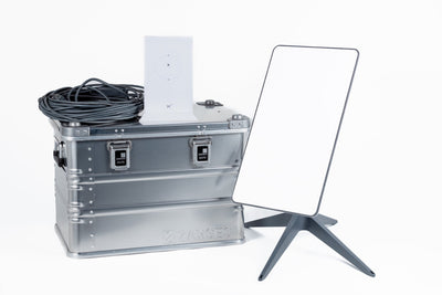 ZARGES Starlink Small Shuttle Case with a Starlink dish, router and coiled cable set beside and on top