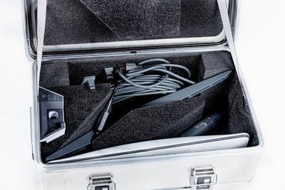 Close-up inside the ZARGES Starlink Small Shuttle Case, black foam holding the dish, router and cable