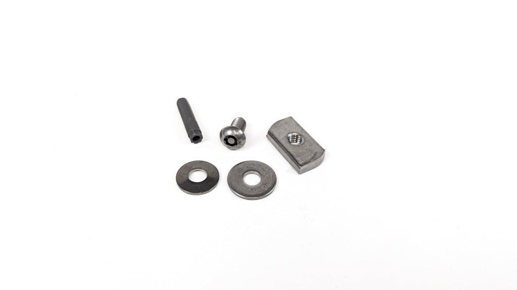 ZARGES Tamper-Resistant Mounting Hardware laid out: key pin, button-head bolt, two washers and channel nut